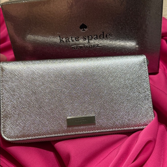 kate spade Handbags - Kate Spade Silver Wallet New
